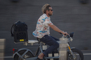 Arto Saari on an electric bike.